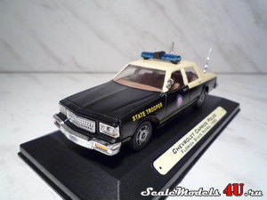 Масштабная модель автомобиля Chevrolet Caprice Police (Florida State Patrol 1988) фирмы White Rose Collectibles.