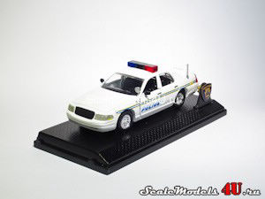 Scale model of Ford Crown Victoria Harrisburg City Police (1999) produced by Road Champs.