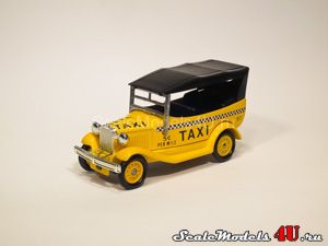 Scale model of Ford Model A "Yellow Taxi" (1934) produced by Lledo.