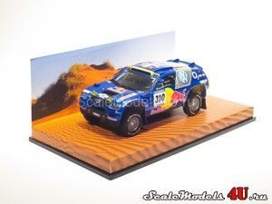 Масштабная модель автомобиля Volkswagen Touareg Paris-Dakar #310 (J.Kleinschmidt - F.Pons 2005) фирмы Minichamps.